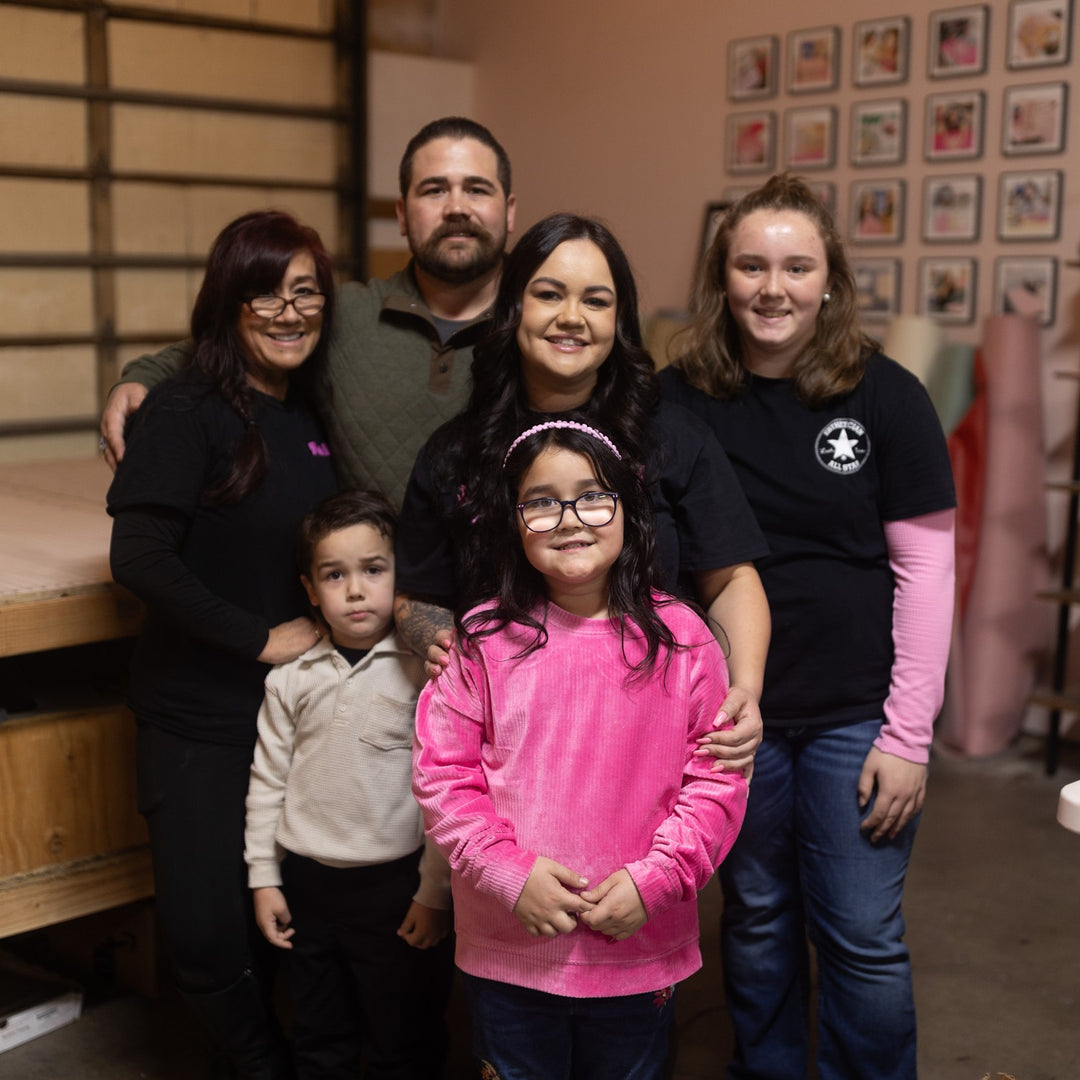 Photo of Bree the owner of Lash and Wax OC and her family.
